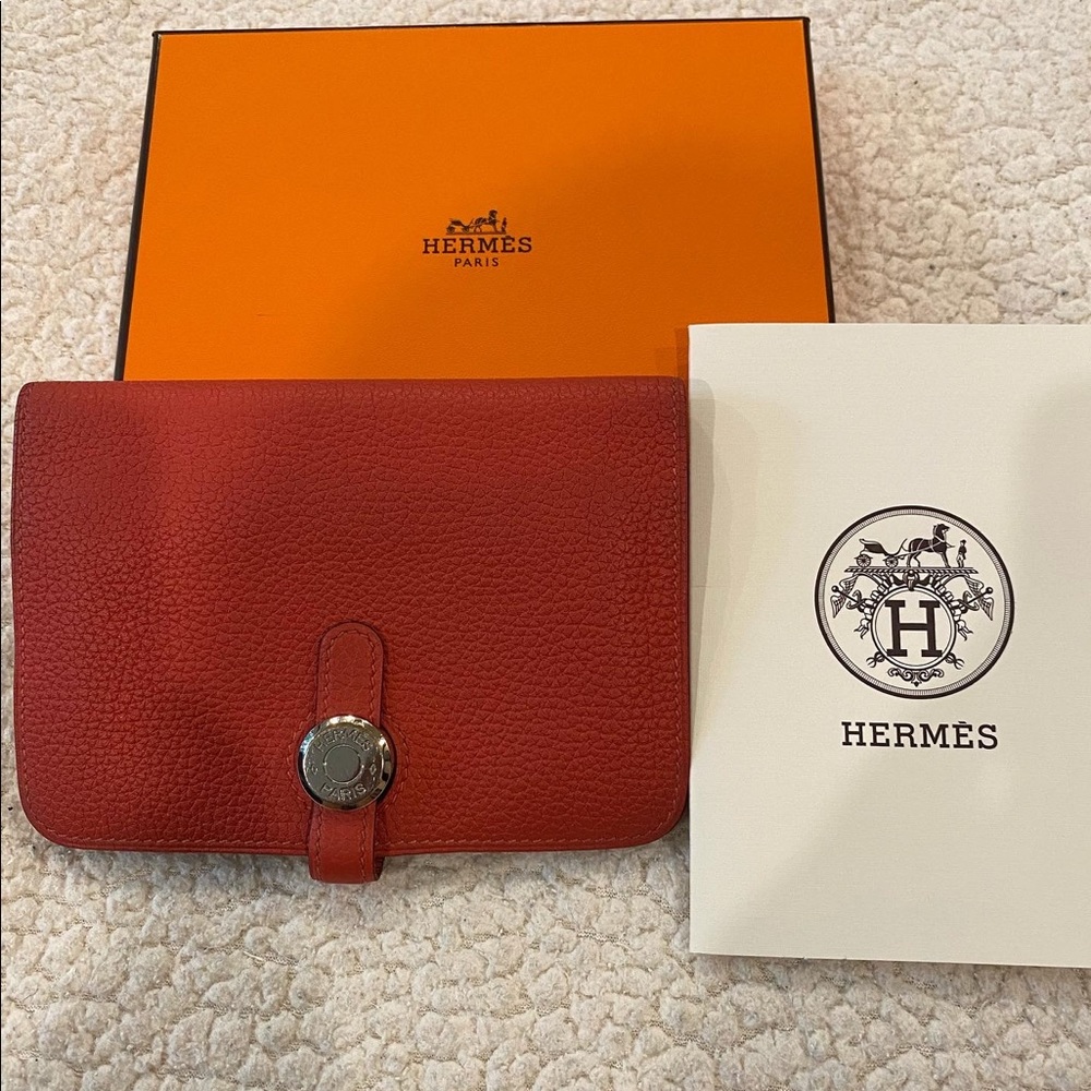 Hermes red wallet.